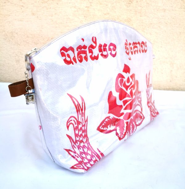 trousse de toilette en sac de marchandise rouge et blanc -fleur rose